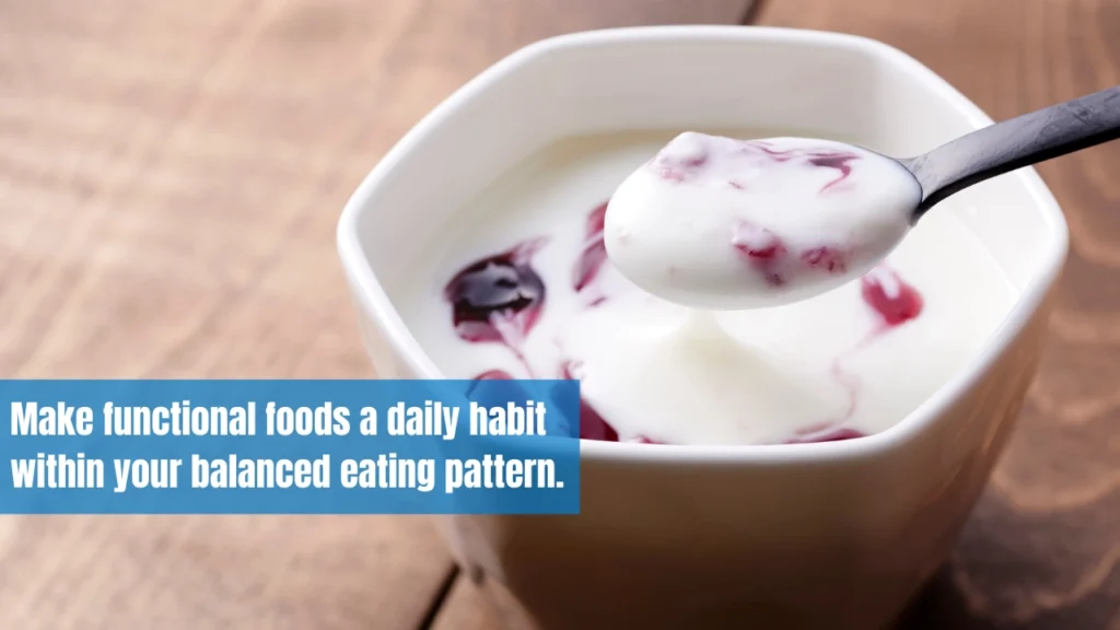 A bowl of yogurt with fruit, representing a probiotic functional food that supports gut health.